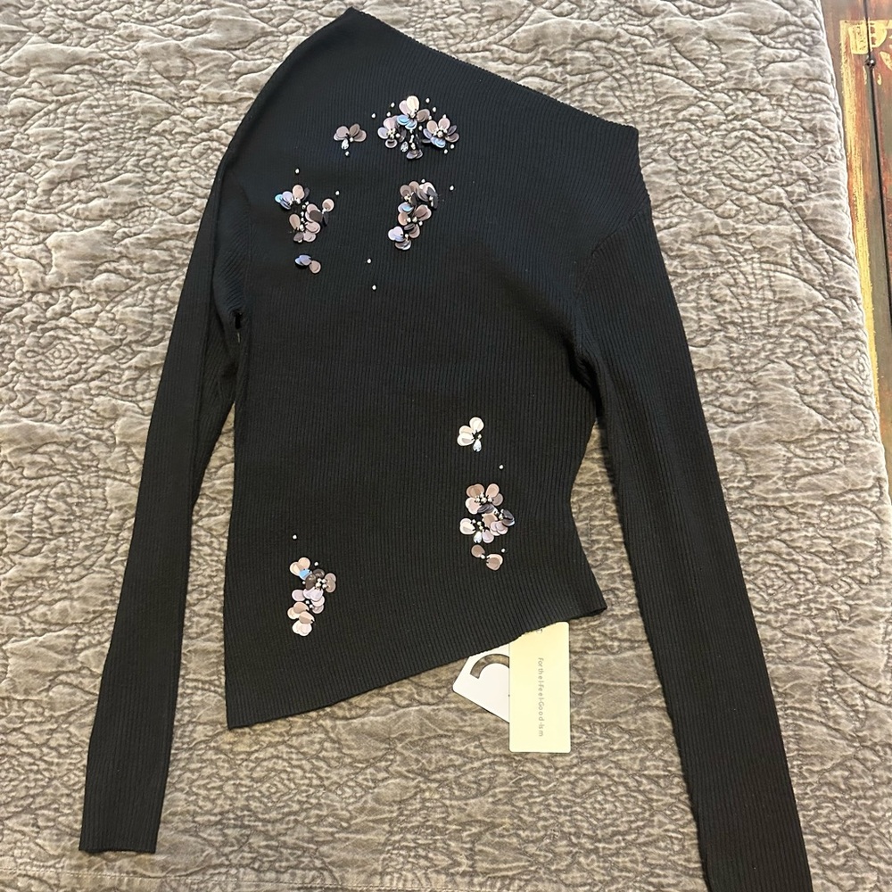 Black Asymmetrical Top with Floral Embellishments